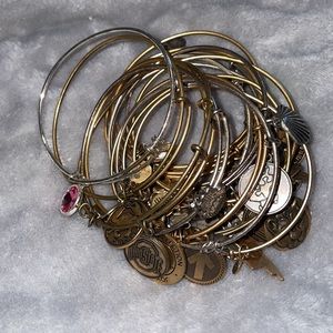 Lot of 18  and Ani Bracelets gold silver OSU libra cancer bee etc